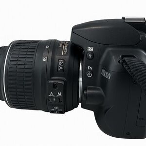 Nikon Black Digital Camera with Textured Grip and Zoom Lens